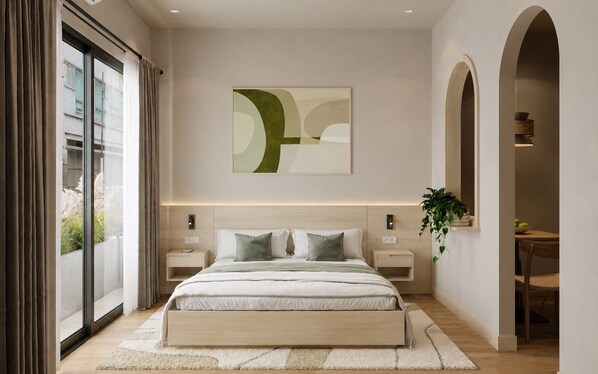 Suite junior, balcón | Escritorio, espacio para trabajar con laptop y cortinas blackout 