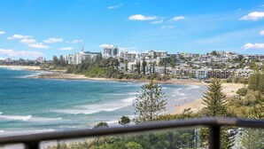 A coastal cityscape with a beach, buildings, and a clear sky. - Sunny Coast Escapes Maroochydore (Maroochydore)