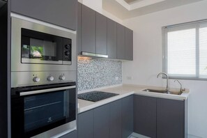 Villa superior, vistas al patio | Cocina privada