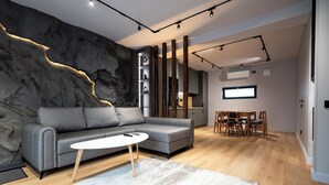Living area - SkyNest Chalet • Jacuzzi • Mountain View • Near Sinaia (Bușteni)