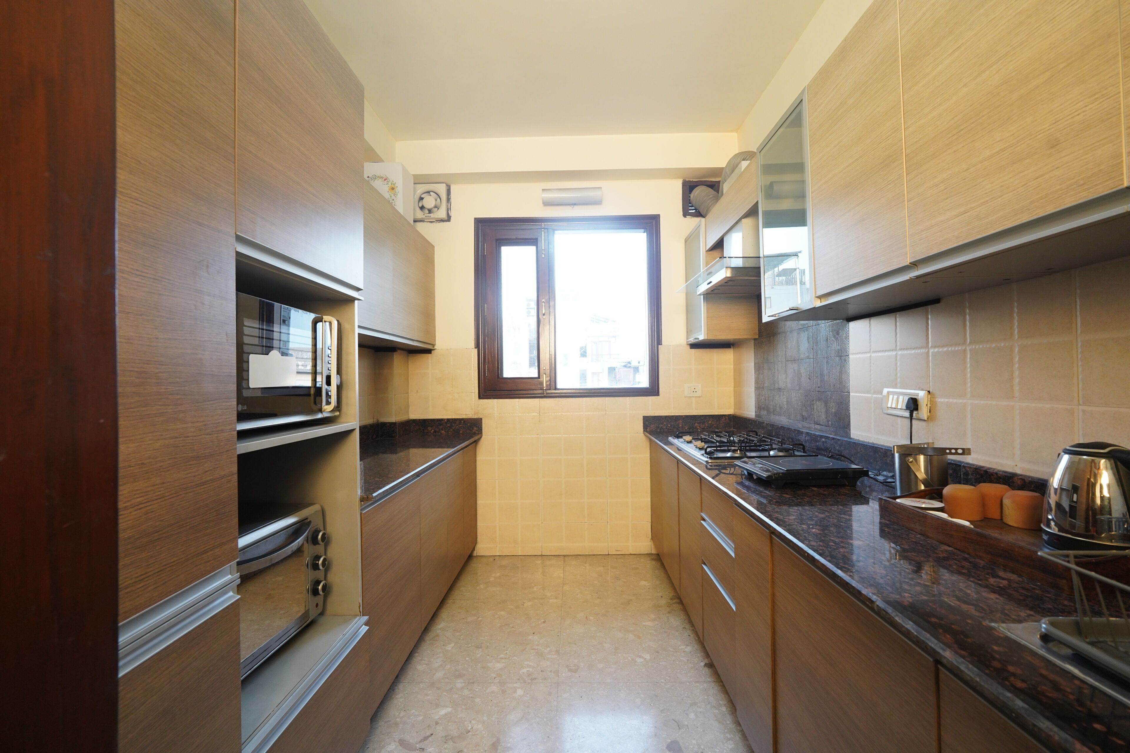 Apartment | Private kitchen | Full-sized fridge, coffee/tea maker