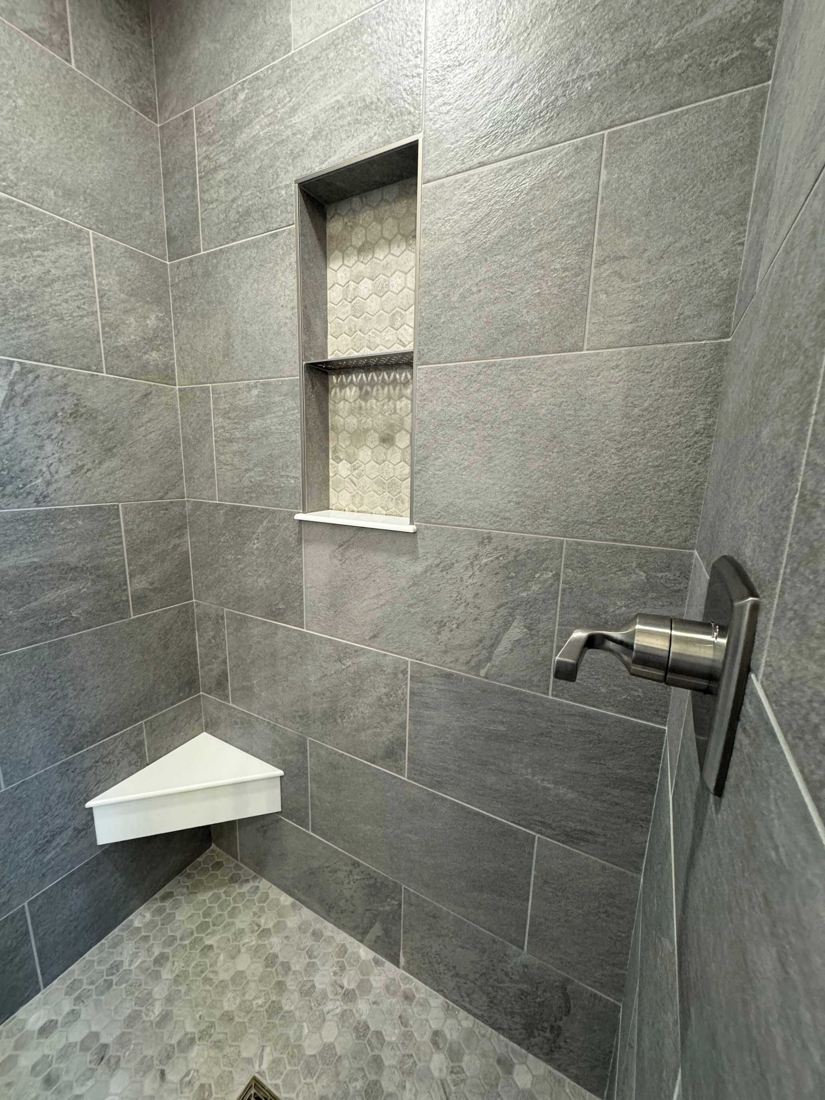 Shower, hair dryer, towels, shampoo