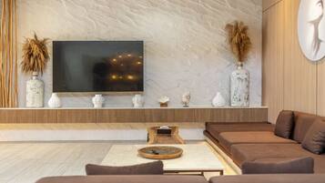 Luxury Villa, 4 Bedrooms, Private Pool | Living area | 50-inch Smart TV with digital channels, fireplace
