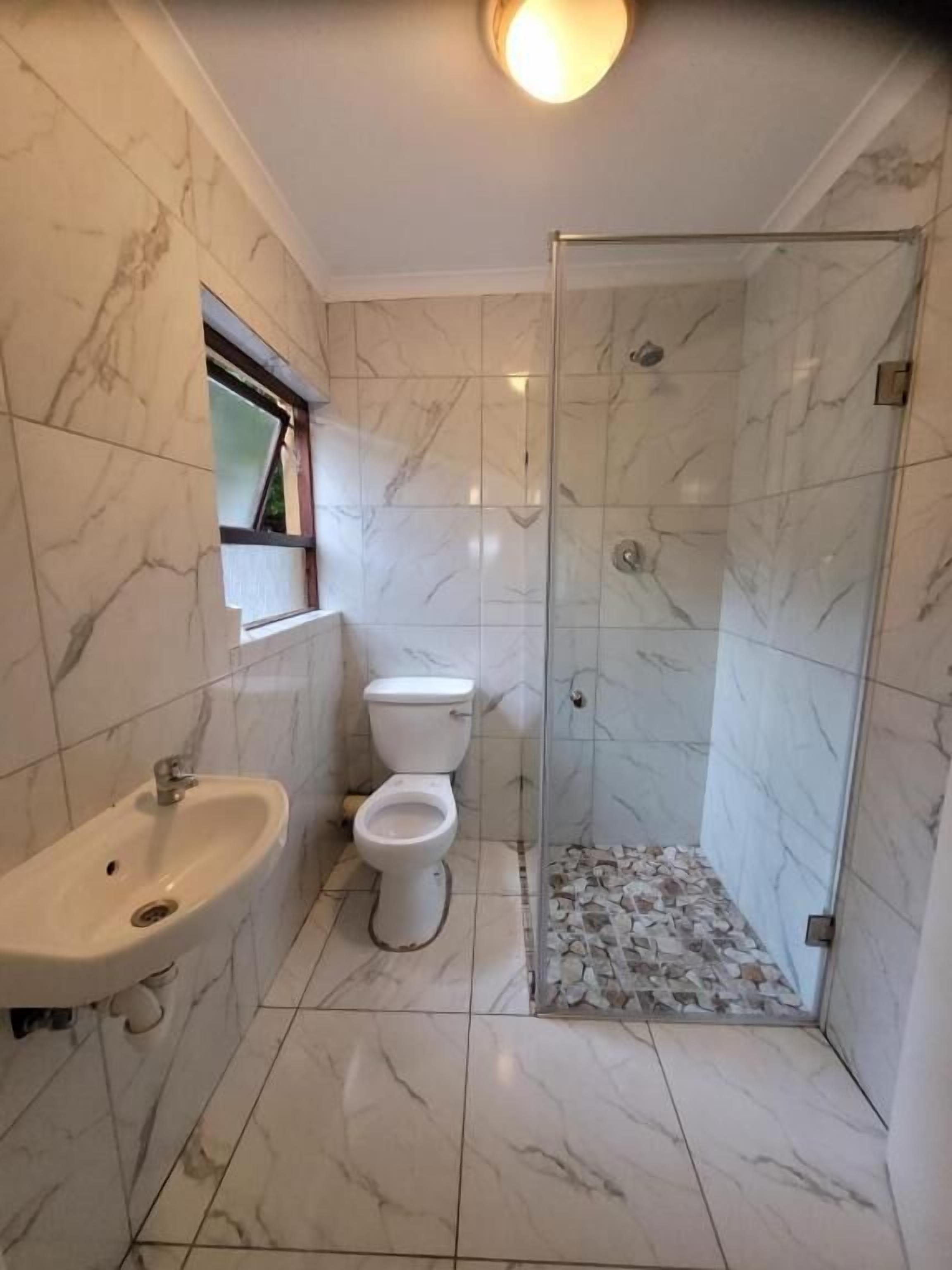 Shower, free toiletries, hair dryer, slippers