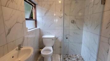 Shower, free toiletries, hair dryer, slippers