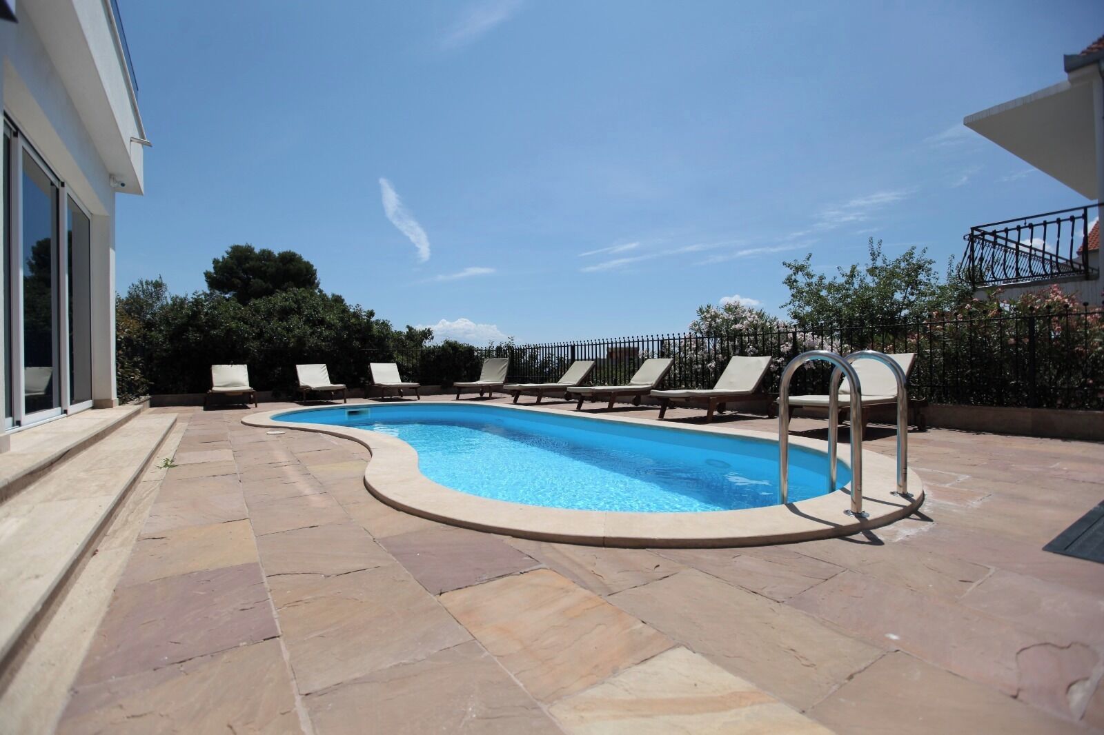 Seasonal outdoor pool, pool umbrellas, pool loungers