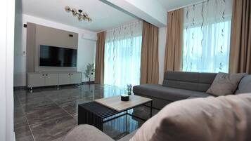 Appartamento Superior, 3 camere da letto, aria condizionata, vista mare parziale | Area soggiorno
