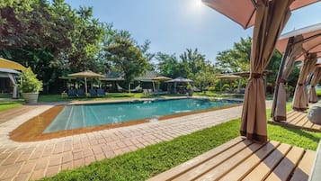 Outdoor pool, pool umbrellas, pool loungers