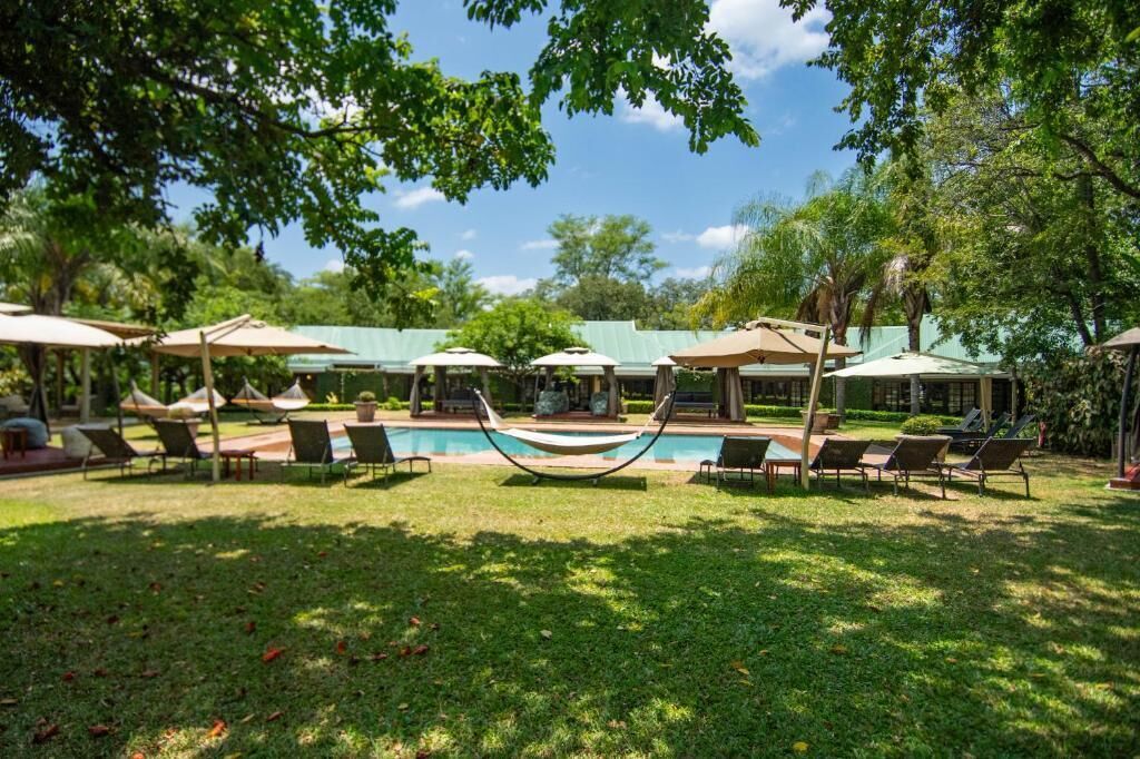 Outdoor pool, pool umbrellas, pool loungers