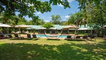 Outdoor pool, pool umbrellas, pool loungers