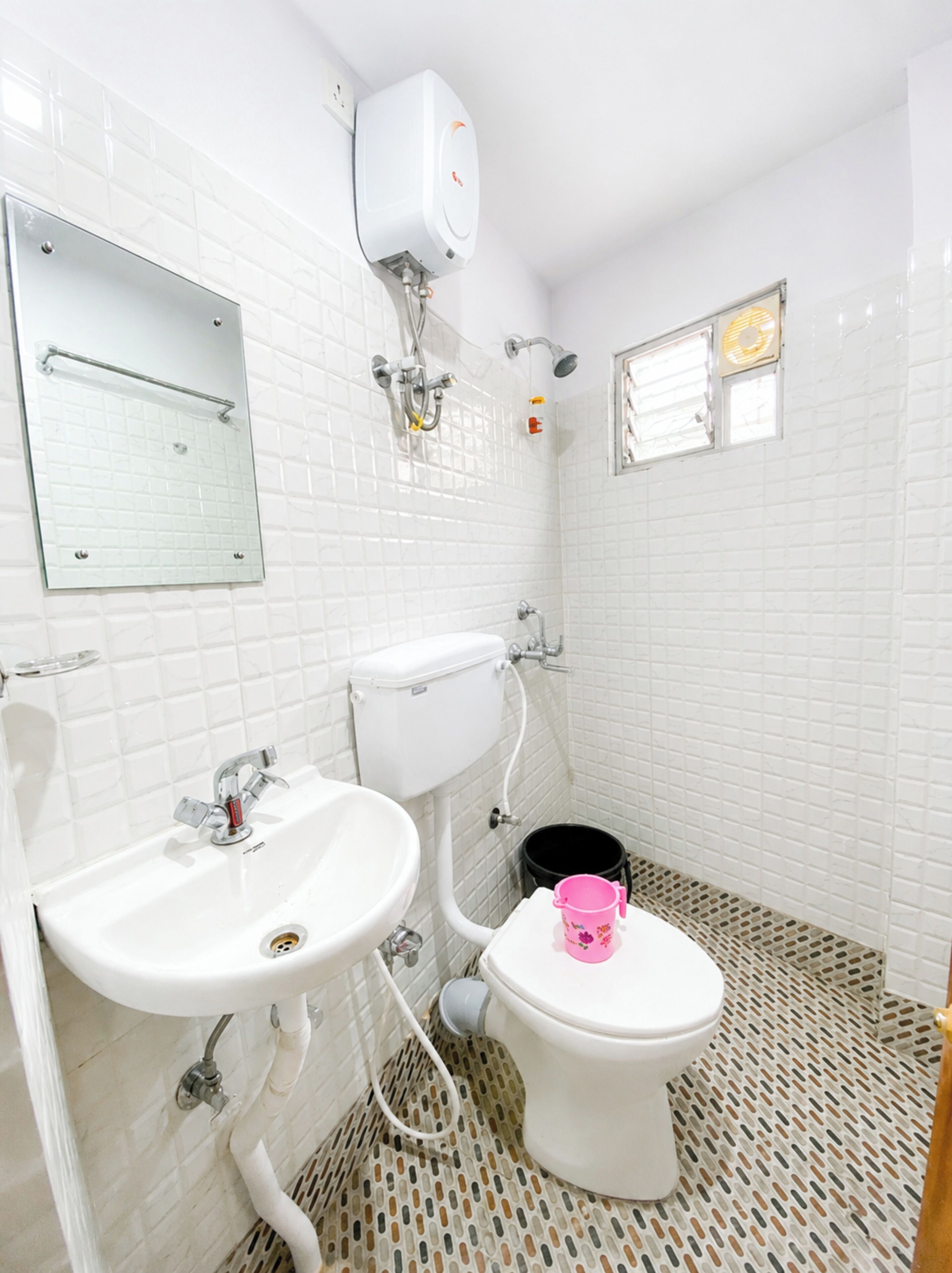 Shower, rainfall showerhead, slippers, towels