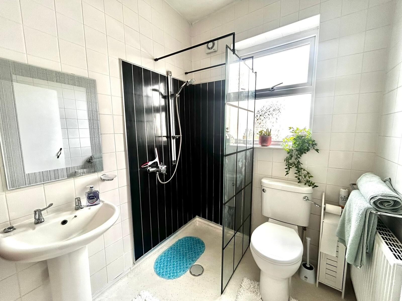 Shower, towels, soap, shampoo