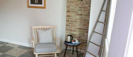 Suite, patio, vistas al jardín | Interior