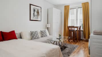 Apartment, 1 Queen Bed, City View | Iron/ironing board, free WiFi, bed sheets
