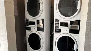 Two stacked front-loading washing machines in a utility room. - King Bed|Mobil Acc|Tub|Nsmk|Kitchen (Wilmington)