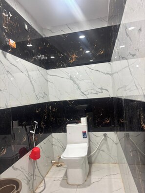 Basic Room, City View | Bathroom | Shower, towels - Manjeet Hotel & Restaurant (Ballia)