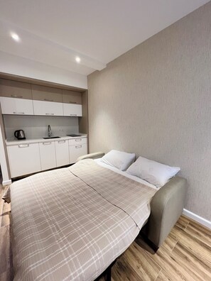 1 habitación, tabla de planchar con plancha, wifi y ropa de cama 