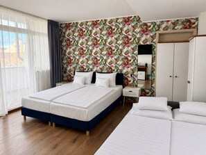 1 habitación, tabla de planchar con plancha, wifi y ropa de cama 
