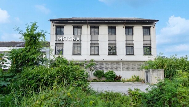 A building with the name 'MOANA' on the facade, surrounded by greenery. - Modern Deluxe Double in Cirebon (Cirebon)