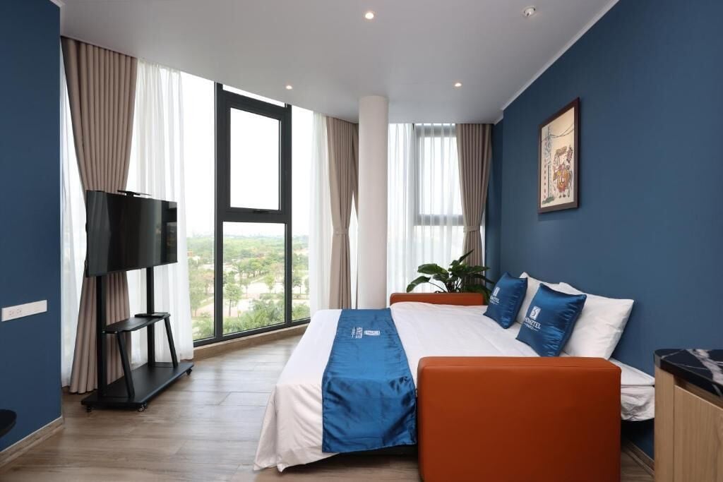 Suite Deluxe, vistes al parc | Escriptori, cortines opaques i wifi gratuïta 