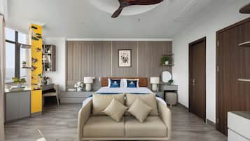 Deluxe Suite, Park View | Desk, blackout drapes, free WiFi