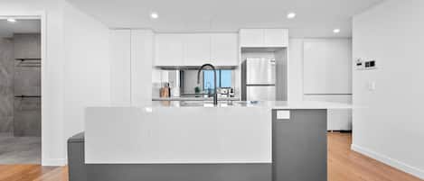 Coffee/tea maker, fridge, microwave, oven