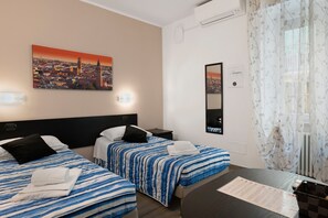 A hotel room with two beds, a cityscape painting, a mirror, a desk with a menu, and a window with curtains.
