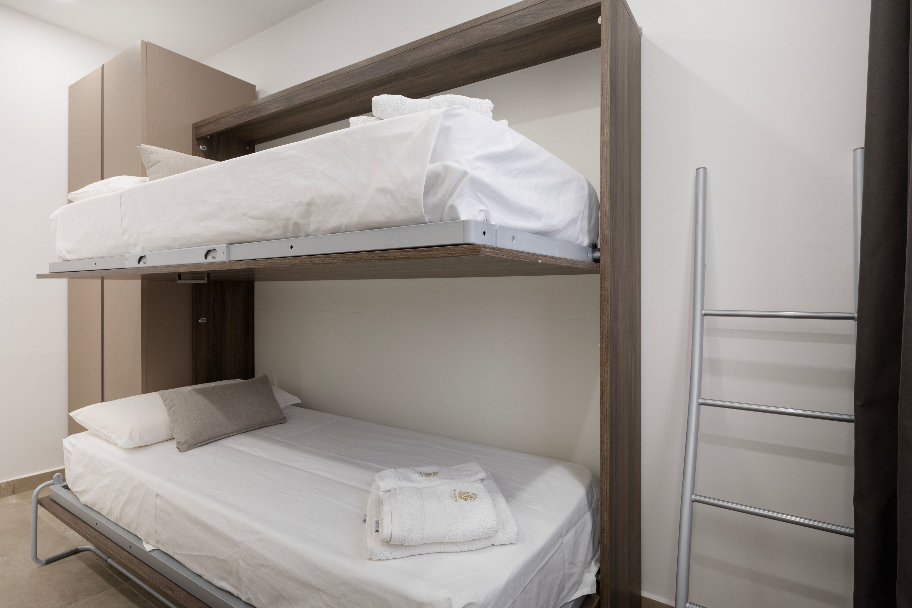 A bunk bed with a lower bed and a top bunk.