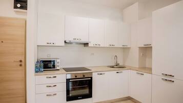 Appartement Confort, véranda, vue mer | Cuisine privée