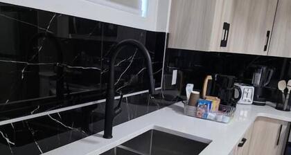 Cozy Irvine Creek Walk-out Suite 10 Mins to YEG
