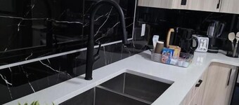 Cozy Irvine Creek Walk-out Suite 10 Mins to YEG