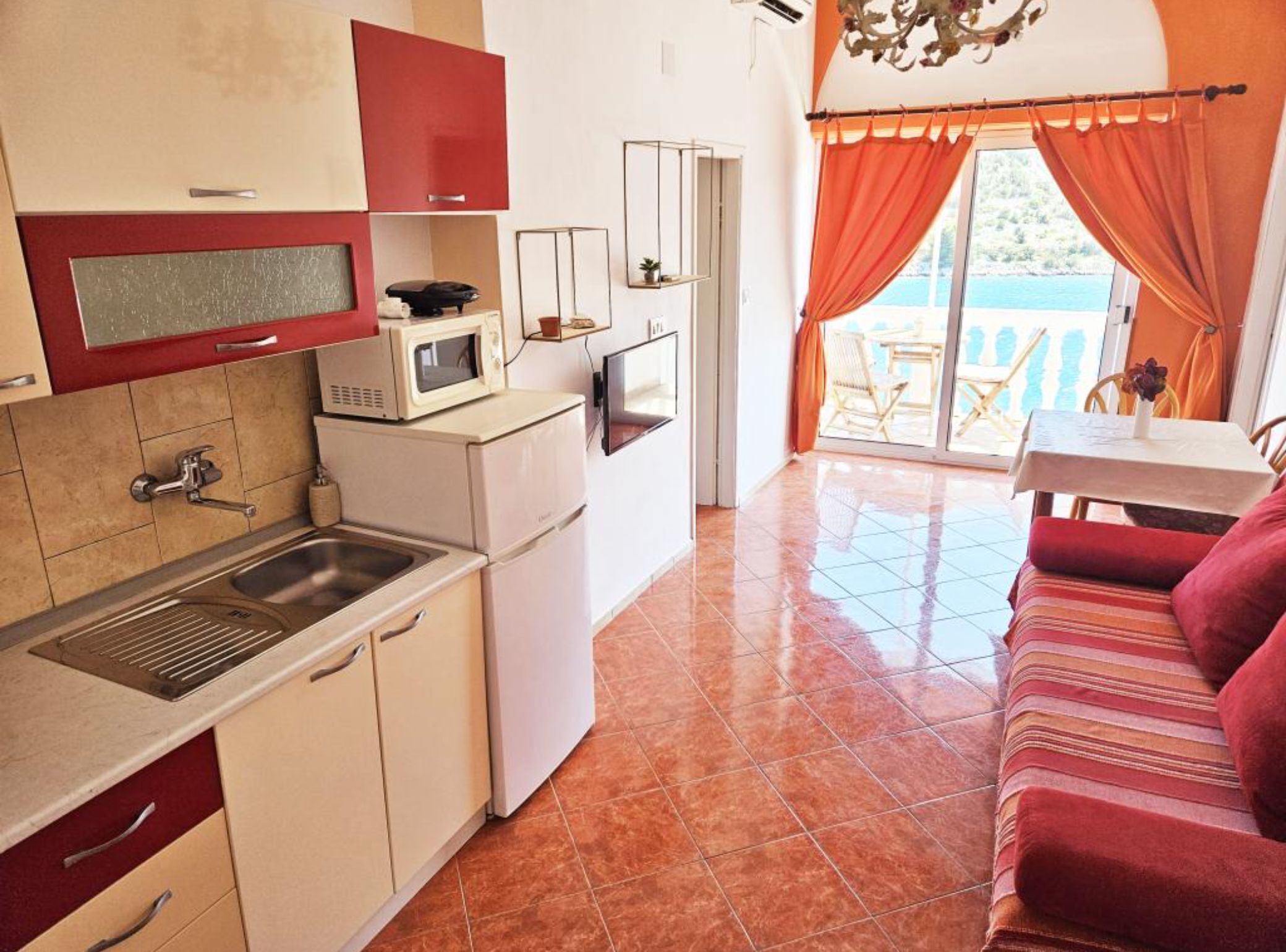 Apartment (Two Bedroom Apartment with Sea View a) | Private kitchen | Fridge