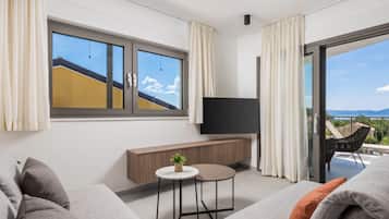 Apartment (Classic Apartment with Balcony) | Living room | 32-inch flat-screen TV with satellite channels