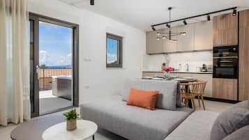 Apartment (Classic Apartment with Balcony) | Living room | 32-inch flat-screen TV with satellite channels