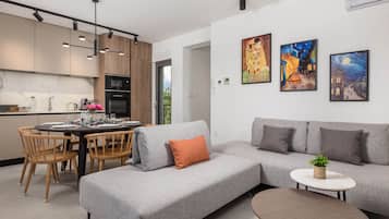 Apartment (Classic Apartment with Balcony) | Living room | 32-inch flat-screen TV with satellite channels