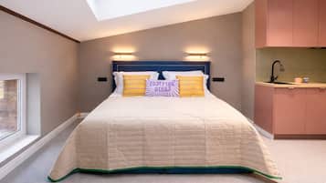 Deluxe Studio Suite | Laptop workspace, blackout drapes, soundproofing, iron/ironing board