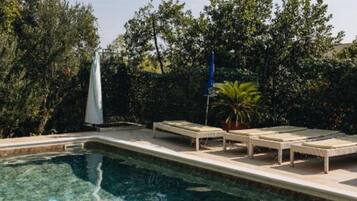 Apartment (Three Bedroom Apartment with Sea View) | Outdoor pool | Seasonal outdoor pool, pool umbrellas, sun loungers