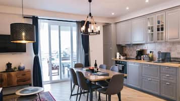 Apartment (Three Bedroom Apartment with Balcony) | Private kitchen | Fridge