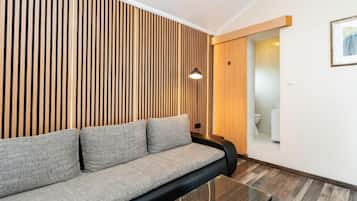 Apartment (One Bedroom Apartment with Balcony) | Living room | 32-inch flat-screen TV with satellite channels