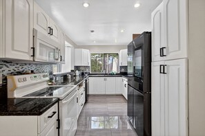 Private kitchen - Spacious Private Villa w/ Pool • Prime Location (Miami)