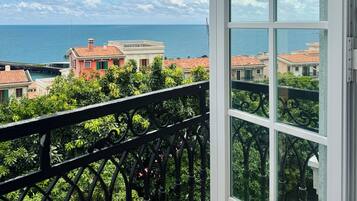 Junior Single Room, Multiple Beds, Balcony, Partial Ocean View | Beach/ocean view