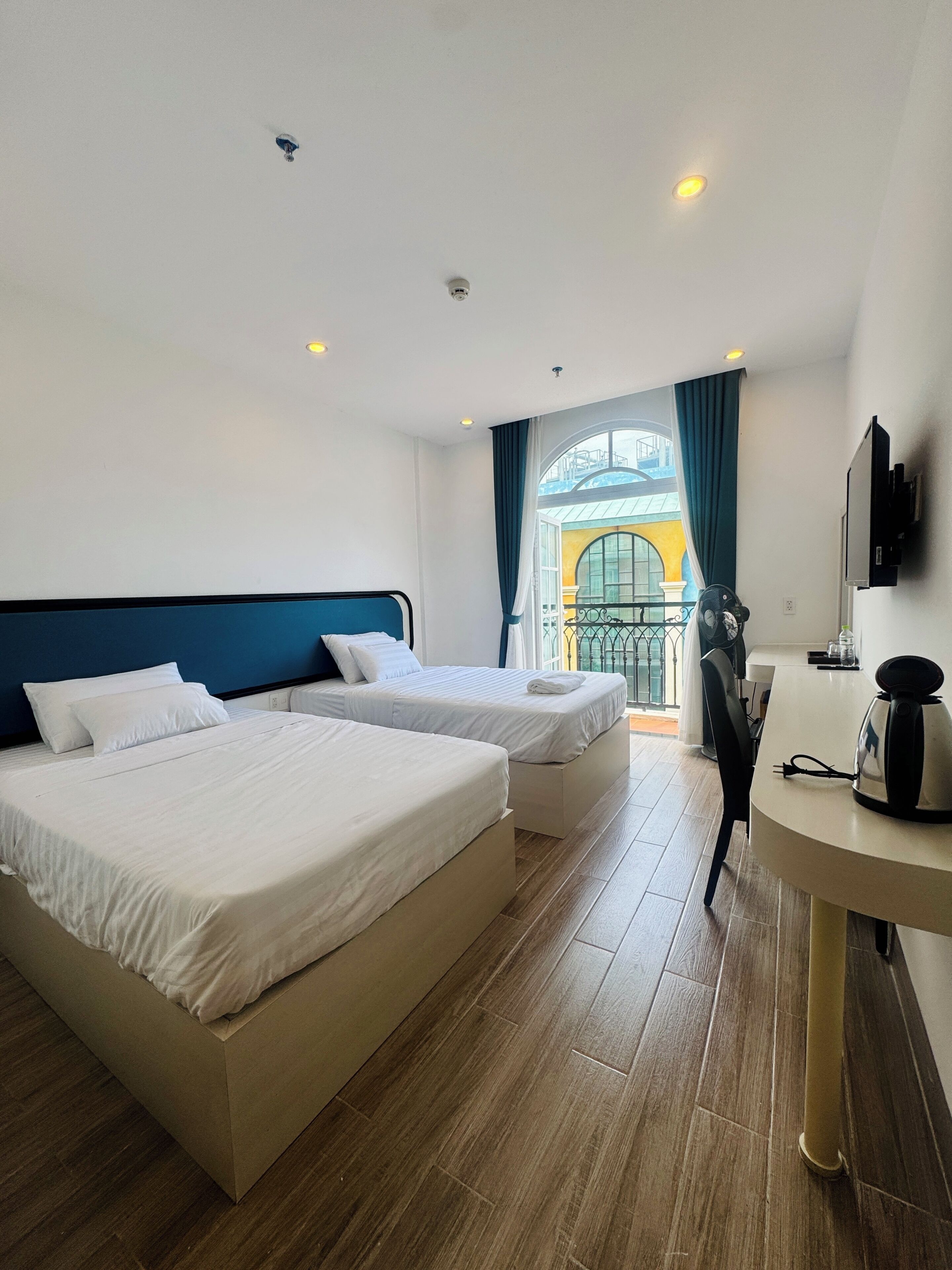 Junior Single Room, Multiple Beds, Balcony, Partial Ocean View | Desk, laptop workspace, free WiFi, bed sheets