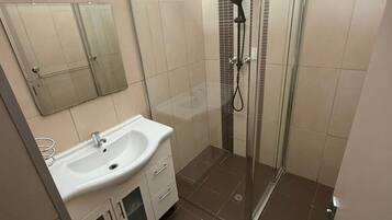 Shower, bidet, towels, soap