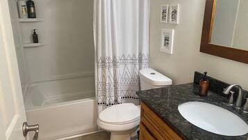 Hair dryer, towels, soap, toilet paper
