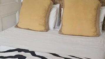 Egyptian cotton sheets, premium bedding, down duvets, memory-foam beds
