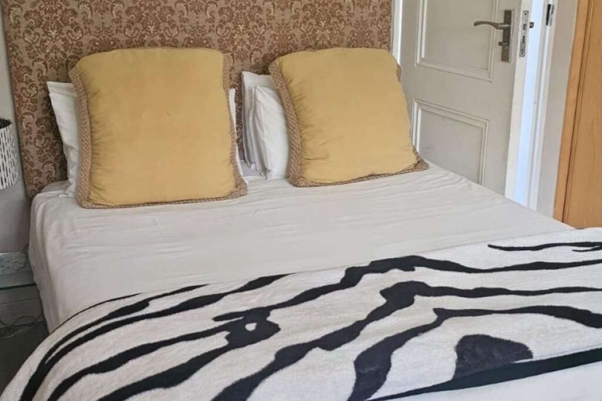 Egyptian cotton sheets, premium bedding, down duvets, memory-foam beds
