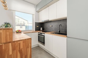 Departamento familiar, balcón, vista al patio | Cocina privada