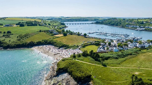An aerial view of a coastal town with a marina, beach, and surrounding greenery. - Two Pod Glamping Retreat in Kinsale, Sea Views (Kinsale)