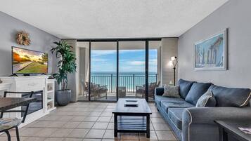 Signature Condo, 1 Bedroom, Ocean View, Oceanfront | Living room | 55-inch Smart TV with digital channels