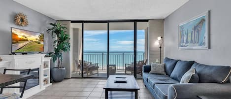 Signature Condo, 1 Bedroom, Ocean View, Oceanfront | Living room | 55-inch Smart TV with digital channels